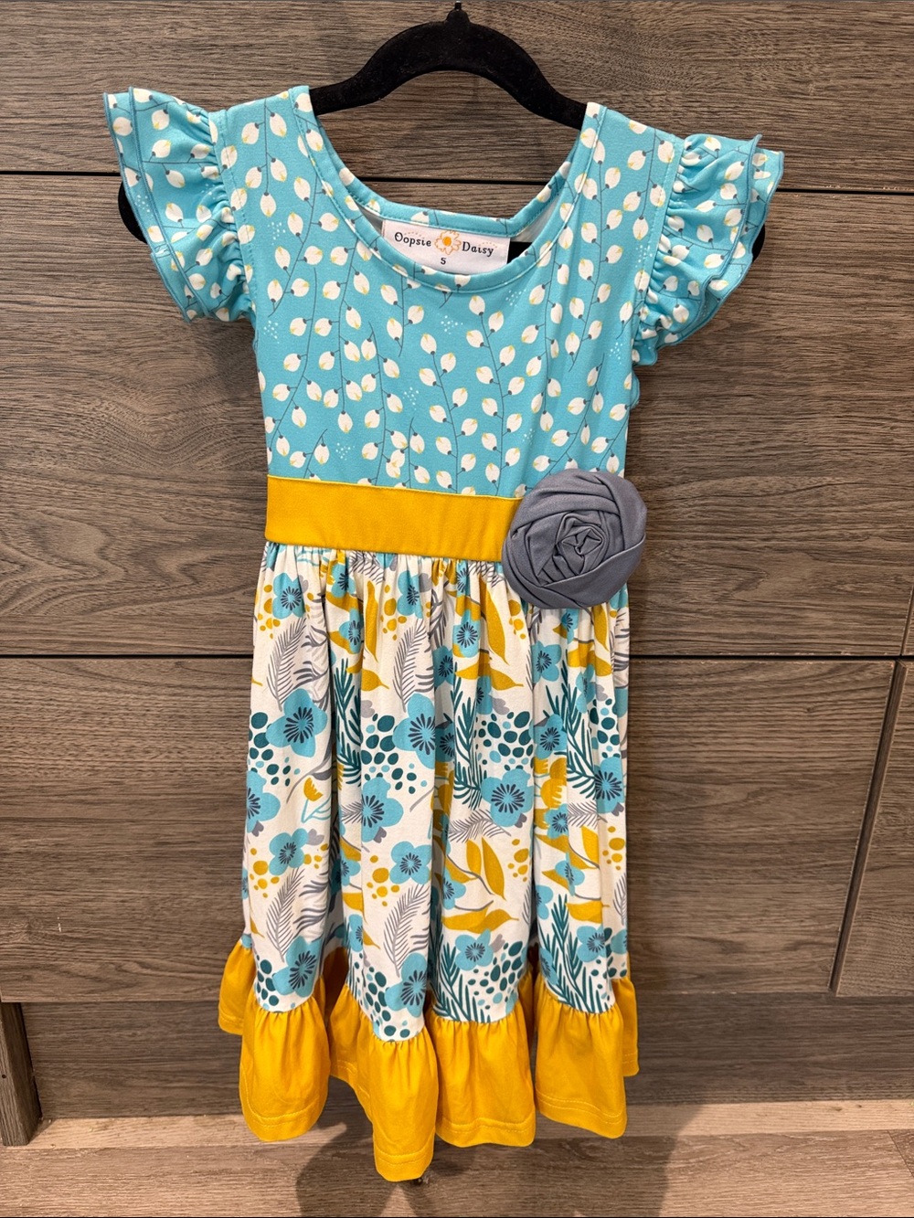 Oopsy Daisy Girls' Teal & Yellow Floral Ruffle Dress with Rosette
